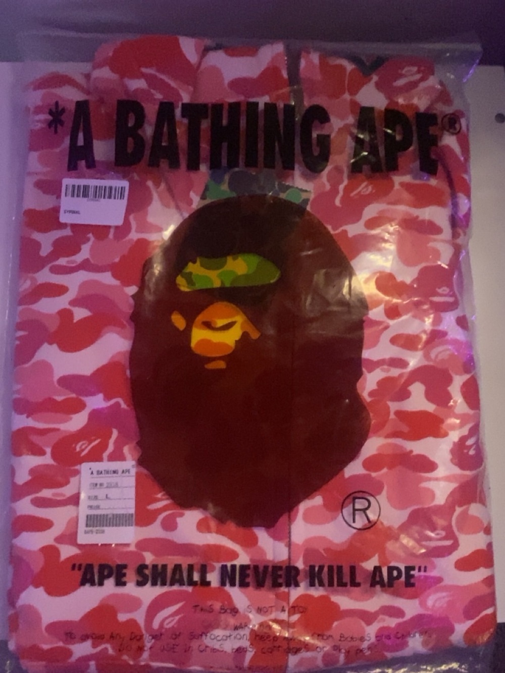 A Bathing Ape Pink Camo Graphic Tee with Ape Head Logo